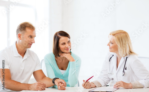 Photo: doctor with patients in cabinet doctor with patients in cabinet