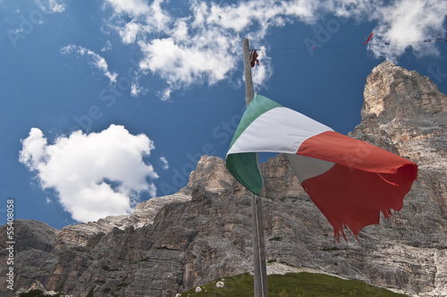 Photo: Italian flag in front of the Dolomites Italian flag in front of the Dolomites