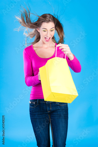 Photo: woman with colored shopping bags woman with colored shopping bags