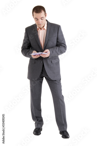 Photo: man counts money man counts money