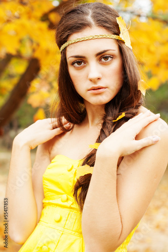 Photo: Autumn woman on leafs background Autumn woman on leafs background