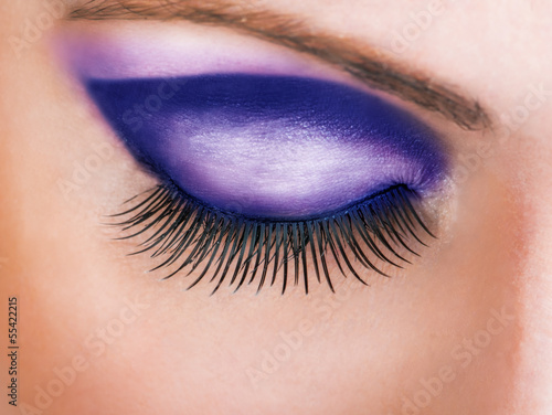 Photo: Close-up of closed beautiful eye Close-up of closed beautiful eye