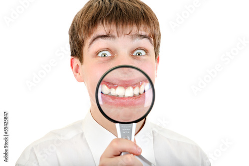 Photo: Funny Teenager with a Loupe Funny Teenager with a Loupe