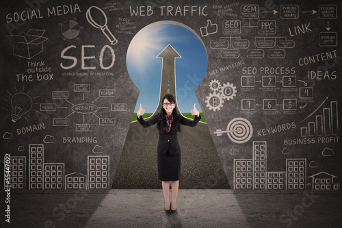 Photo: Businesswoman thumbs up and success road view Businesswoman thumbs up and success road view
