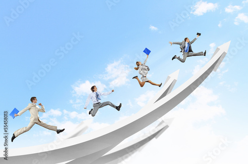 Photo: Businesspeople jumping Businesspeople jumping