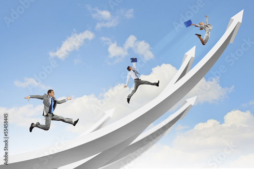 Photo: Businesspeople jumping Businesspeople jumping