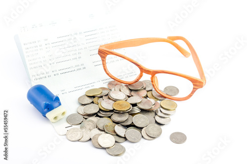 Photo: saving money,Account assbook and bluy pig bank saving money,Account assbook and bluy pig bank