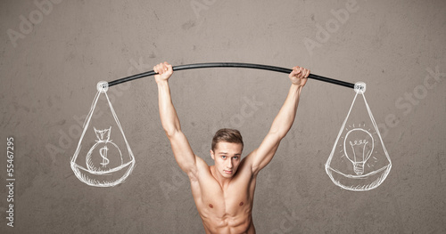 Photo: muscular man trying to get balanced muscular man trying to get balanced