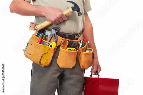 Photo: Handyman with a tool belt. Handyman with a tool belt.