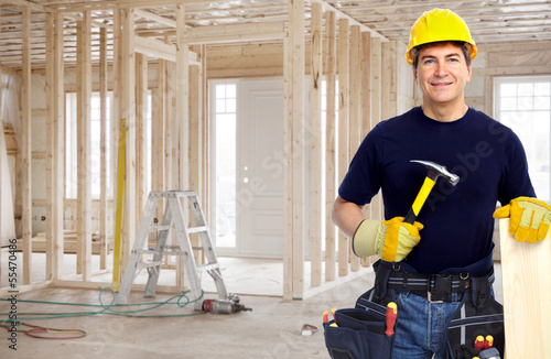 Photo: Handyman with a hammer. Handyman with a hammer.