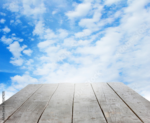 Photo: wooden podium on background beautiful celestial landscape wooden podium on background beautiful celestial landscape