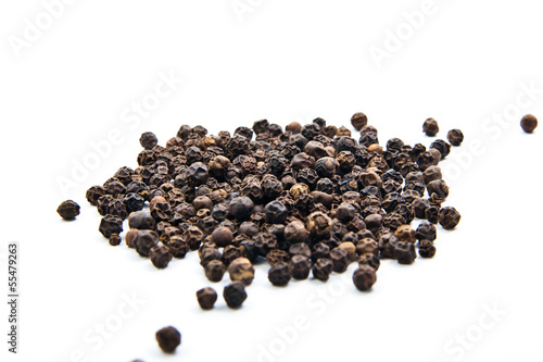 Photo: Black pepper isolated on the white background Black pepper isolated on the white background
