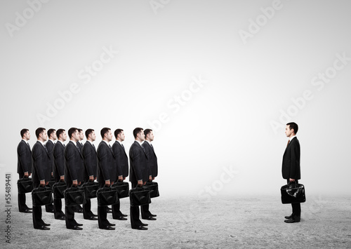 Photo: many businessmen with briefcase many businessmen with briefcase