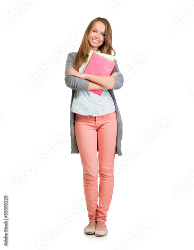 Photo: Student Girl Full Length Portrait. Teenage Girl Holding Books Student Girl Full Length Portrait. Teenage Girl Holding Books