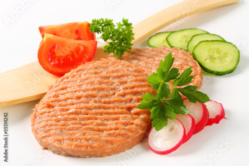 Photo: Raw burger patties Raw burger patties
