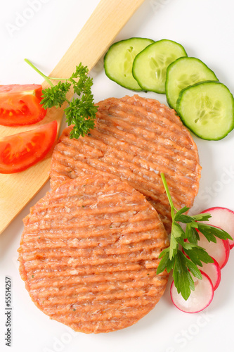 Photo: Raw burger patties Raw burger patties