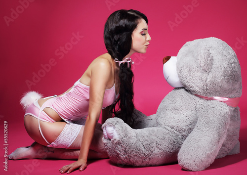 Photo: Seductive Playful Woman in Pink Lingerie with Teddy Bear Seductive Playful Woman in Pink Lingerie with Teddy Bear