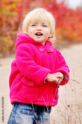 Photo: toddler girl in fall park toddler girl in fall park