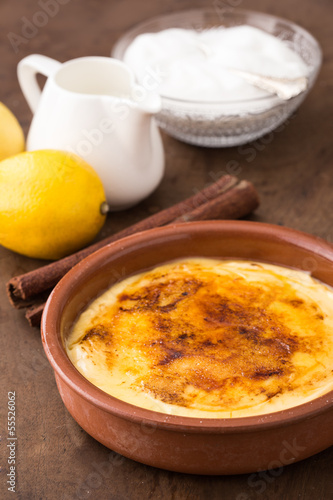 Photo: Traditional creme brulee on ceramic dish Traditional creme brulee on ceramic dish