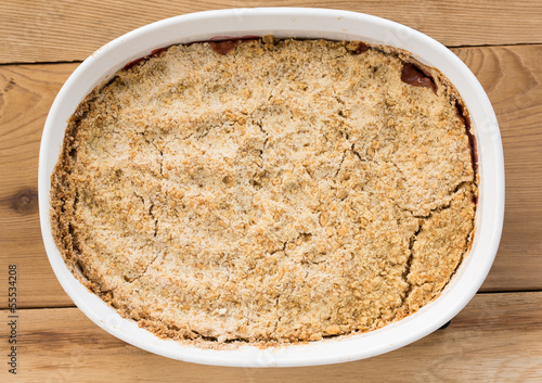 Photo: Traditional british apple crumble pie in dish Traditional british apple crumble pie in dish