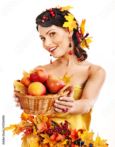Photo: Woman holding autumn basket. Woman holding autumn basket.