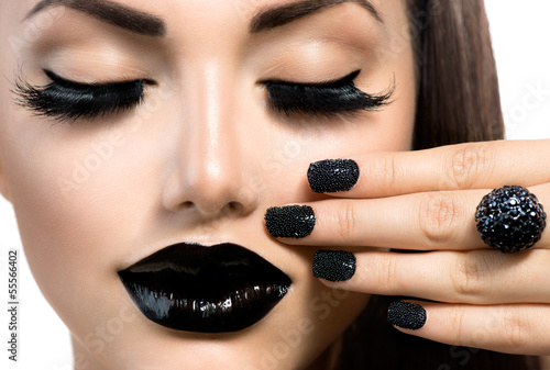Photo: Beauty Fashion Girl with Trendy Caviar Black Manicure and Makeup Beauty Fashion Girl with Trendy Caviar Black Manicure and Makeup