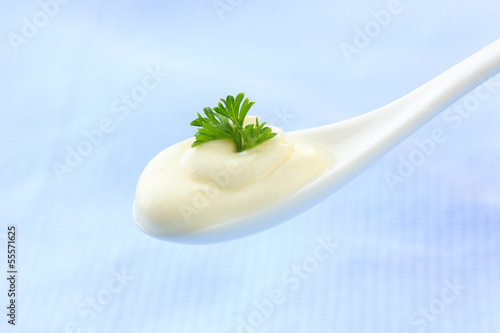 Photo: Sour cream in spoon close-up Sour cream in spoon close-up