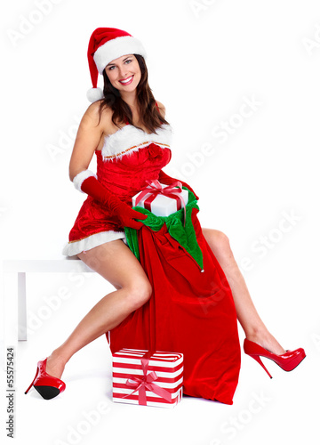 Photo: Santa helper Christmas girl with a presents. Santa helper Christmas girl with a presents.