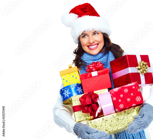 Photo: Santa helper Christmas girl with a presents. Santa helper Christmas girl with a presents.