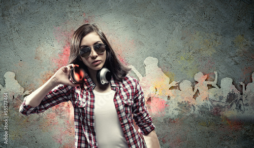 Photo: Young woman with headphones Young woman with headphones