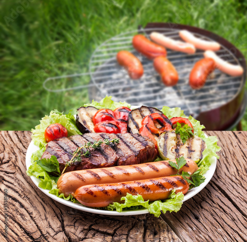 Photo: steak, sausage and vegetable steak, sausage and vegetable