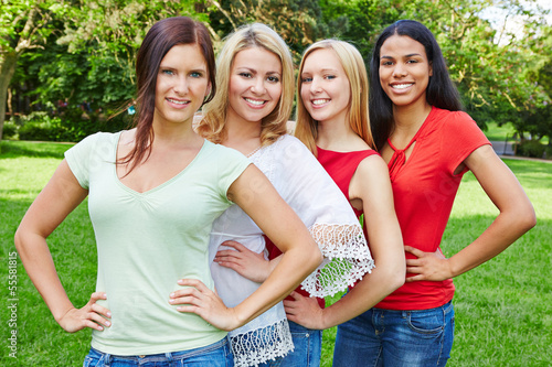 Photo: Group of four happy women in nature Group of four happy women in nature