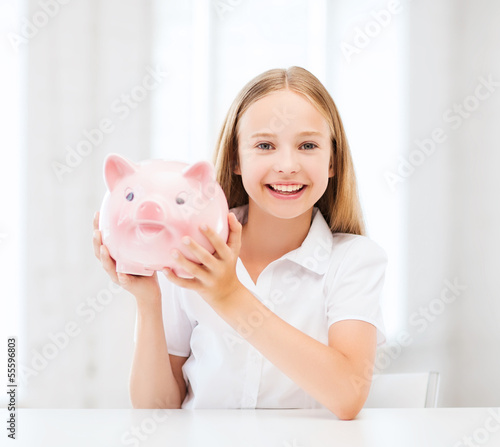 Photo: child with piggy bank child with piggy bank
