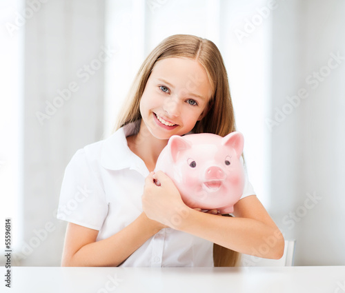 Photo: child with piggy bank child with piggy bank