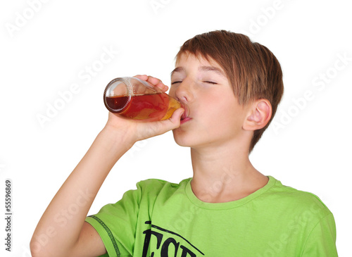 Photo: boy with bottle of juice boy with bottle of juice