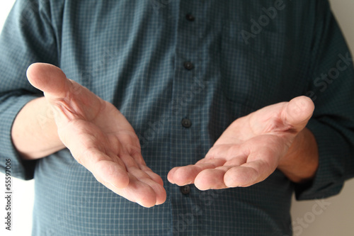 Photo: two-hand gesture of why or how two-hand gesture of why or how