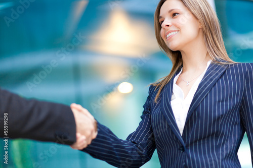 Photo: Businesswoman shaking hand Businesswoman shaking hand
