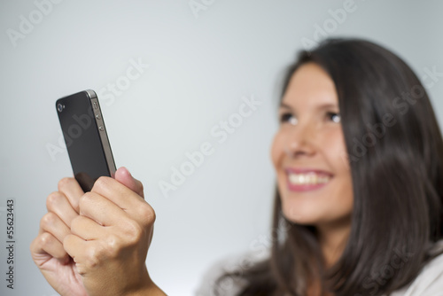 Photo: woman with smartphone woman with smartphone
