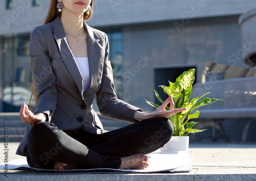 Photo: businesswoman meditating businesswoman meditating
