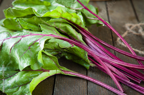 Photo: fresh beet leaves (chard) on the table fresh beet leaves (chard) on the table