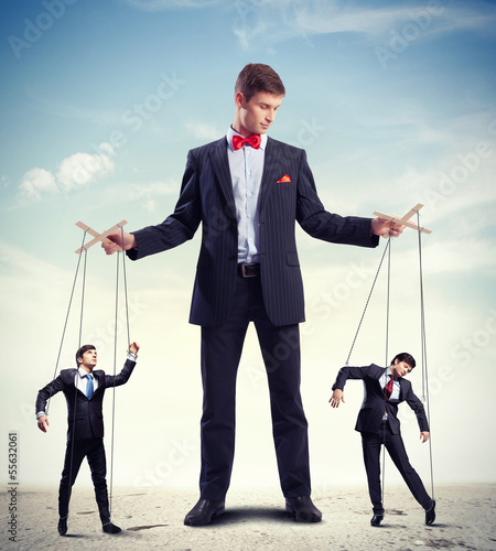 Photo: Businessman puppeteer Businessman puppeteer