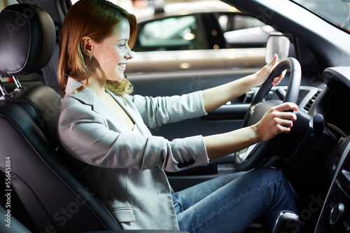 Photo: Female in new car Female in new car