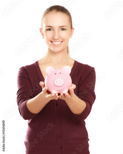 Photo: Young beautiful woman with piggy bank (money box) Young beautiful woman with piggy bank (money box)
