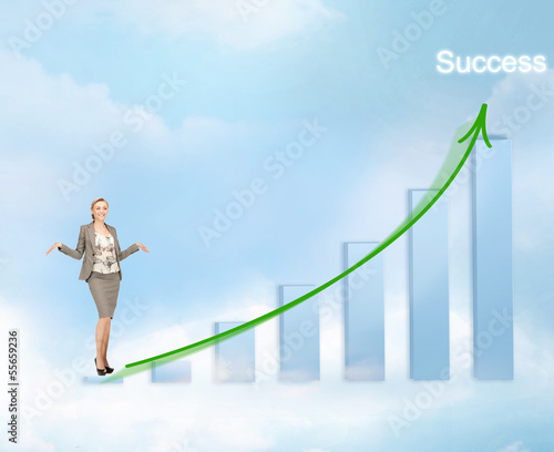 Photo: businesswoman with big 3d chart businesswoman with big 3d chart