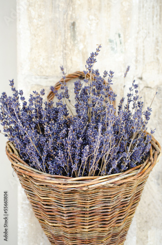 Photo: Violet dry lavender flowers in the basket Violet dry lavender flowers in the basket