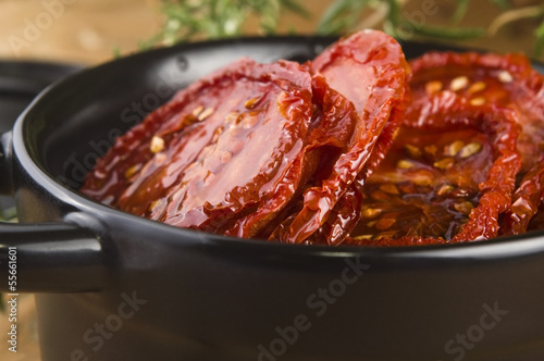 Photo: Sun dried tomatoes with olive oil Sun dried tomatoes with olive oil