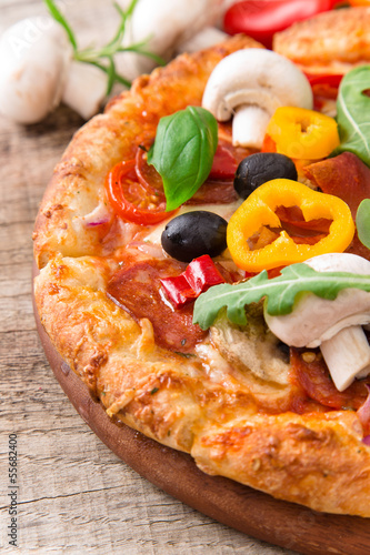Photo: Delicious italian pizza Delicious italian pizza