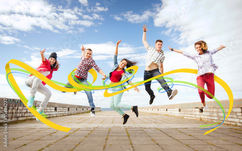 Photo: group of teenagers jumping group of teenagers jumping