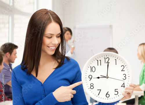 Photo: student showing clock student showing clock