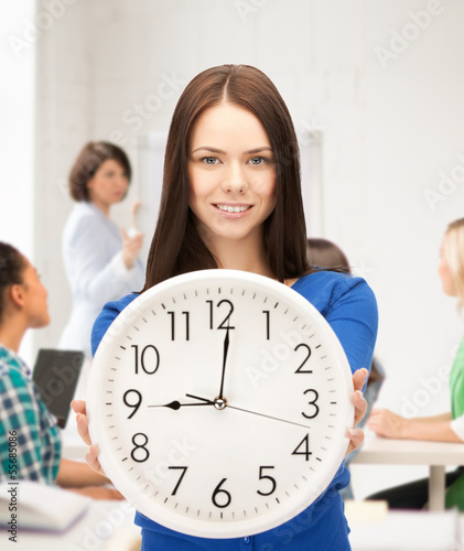 Photo: student showing clock student showing clock